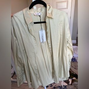 Beautiful long sleeve button up blouse. Beige/sage colour